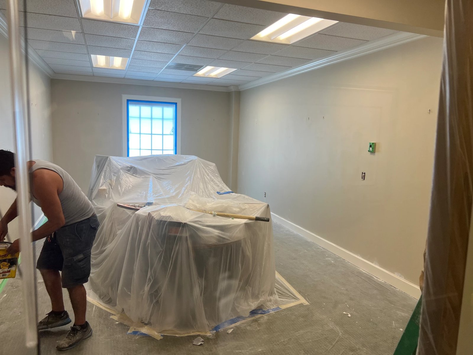 Commercial office suite masked and prepped for interior repainting
